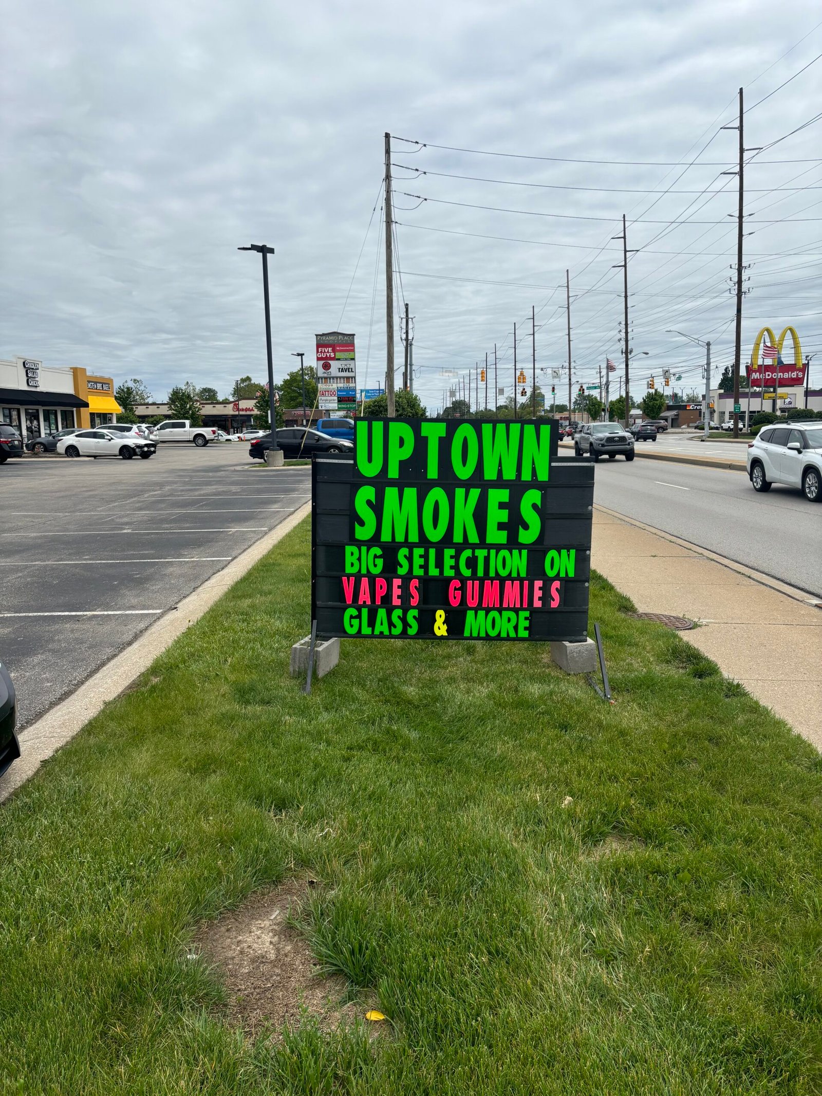 Uptown Smokes sign by Black Sign Specialist